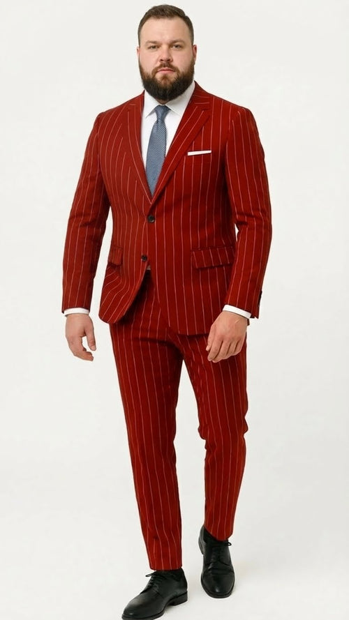 Men's red pinstripe suit with a vested, two-button jacket. Smooth fabric, white vertical stripes. Features front flap pockets, breast pocket, and matching tailored trousers.
