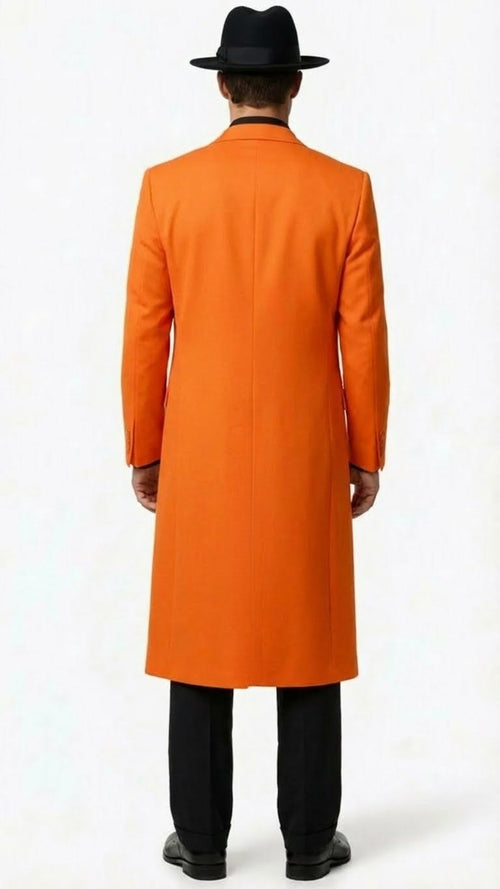 Orange long zoot suit with black shirt & pants. Features knee-length, straight-cut coat with subtle sheen. Includes black fedora. Smooth fabric.