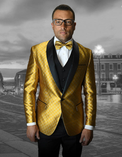 Men's one-button shawl tuxedo with geometric gold chain print and textured fabric. Features black lapel/button, side pockets, and matching vest for a complete, formal look.