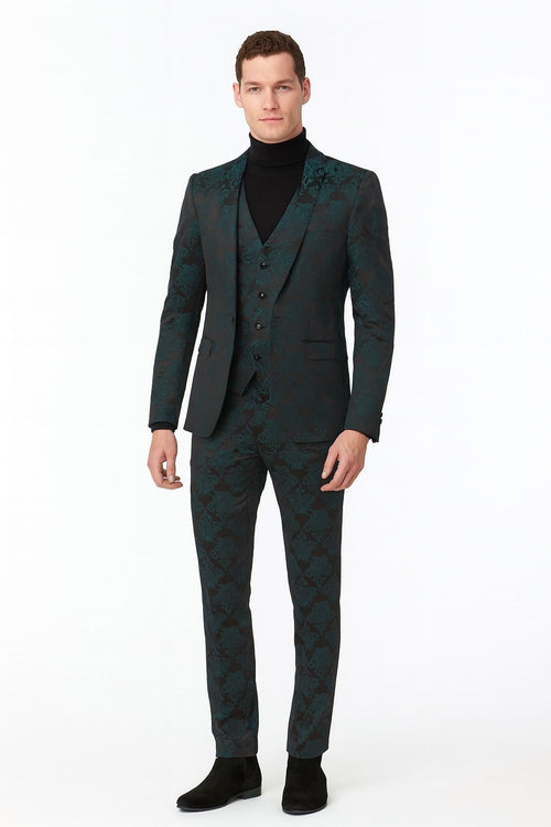 Emerald green floral jacquard 3-piece tuxedo suit for men. Features fitted jacket with shawl collar, 5-button vest, and slim-fit trousers. Intricate green floral pattern on dark background. Tailored for a cohesive silhouette.