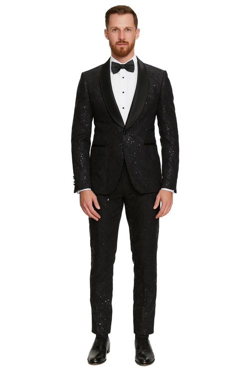 Black sequin tuxedo suit with a fitted silhouette, satin shawl lapel, and tailored pants. Includes a white dress shirt and black bow tie for a complete look.
