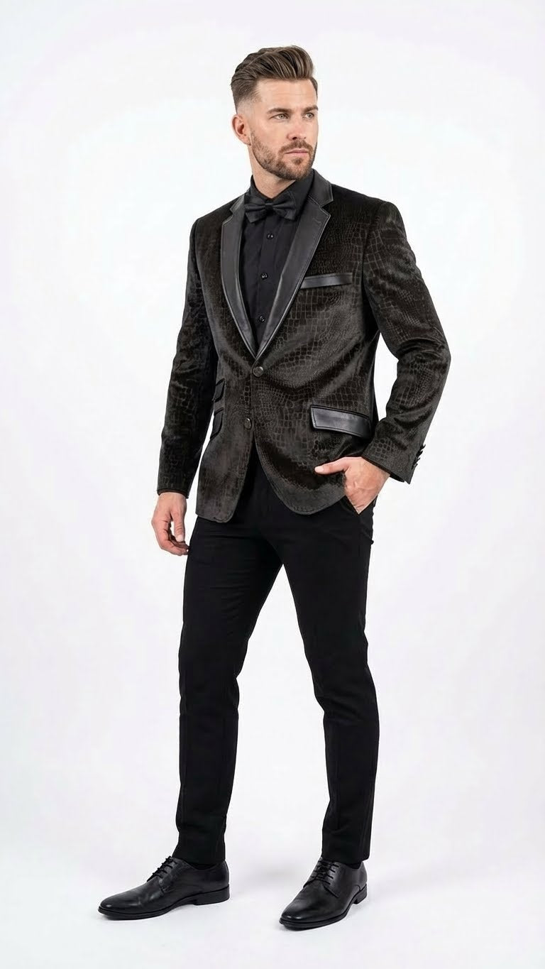 Men's olive-green blazer with crocodile/alligator skin texture. Structured fit, subtle pattern. Features black lapels and pockets. Exotic and stylish.