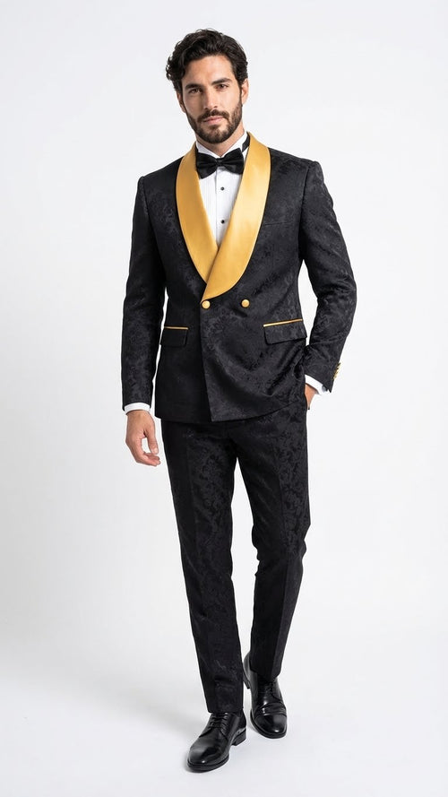 Black & gold jacquard tuxedo suit for men. Slim fit, textured black fabric, gold satin shawl collar. Double-button jacket, side pockets, matching trousers.