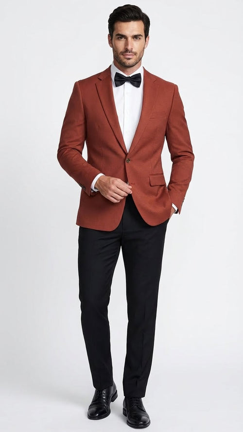Brick copper rust men's blazer. Fitted cut, single-breasted, notched lapels, and two front pockets. Smooth fabric with subtle texture.