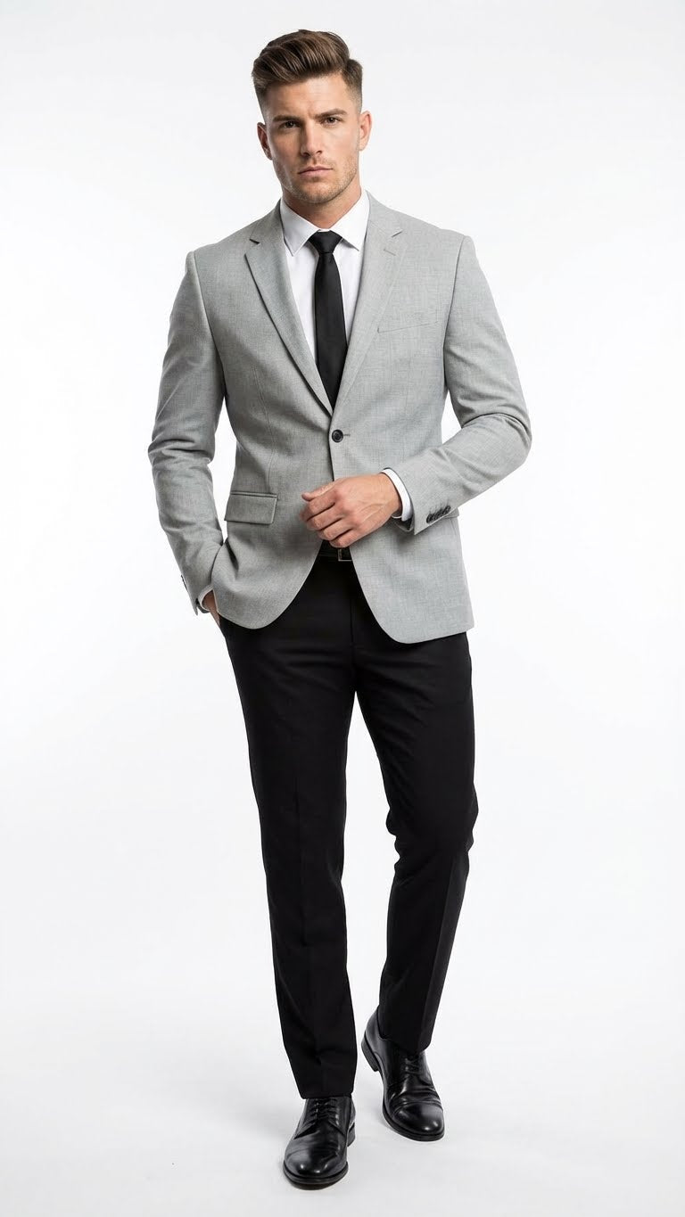 Light grey, slim-fit blazer with black pants. Single-button closure, notch lapels, textured fabric. Tailored, slim-fit pants complement the blazer's structured design.