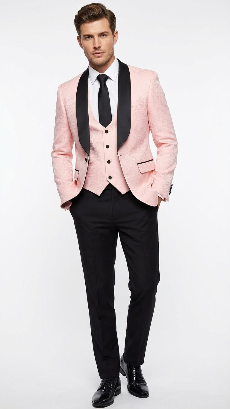 Men's blush pink tuxedo suit: jacket w/ black shawl lapel, structured shoulders, textured fabric. Includes matching vest & black dress pants. Single-breasted, button closure, pockets.