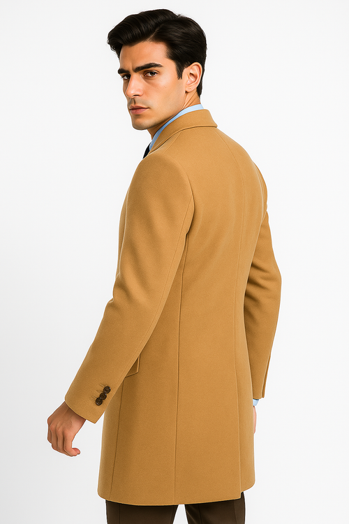 Men's camel wool & cashmere overcoat. Full-length, fitted, structured silhouette. Smooth texture, notched lapel, single-breasted button closure. Tailored seaming, fitted sleeves with cuff buttons. Formal design.