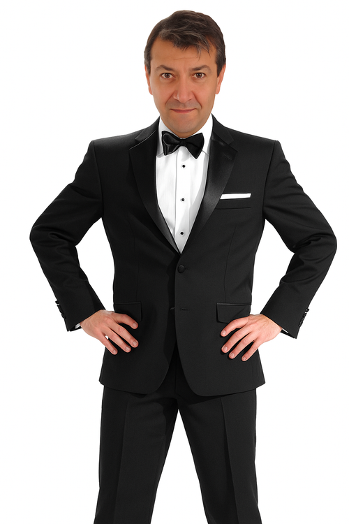 Mantoni 140s black wool tuxedo. Tailored fit, single-button closure, satin peak lapel. Includes white pocket square, two front pockets, and matching streamlined trousers. Solid black, formal design.