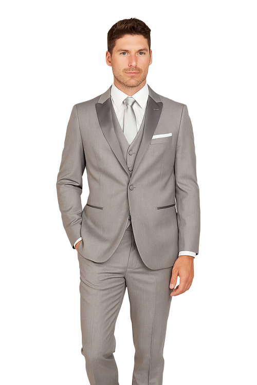 Gray tuxedo set with fitted jacket (satin shawl lapel, single button, breast pocket with white pocket square), matching pants & vest. Smooth, slightly sheened fabric. Formal attire.