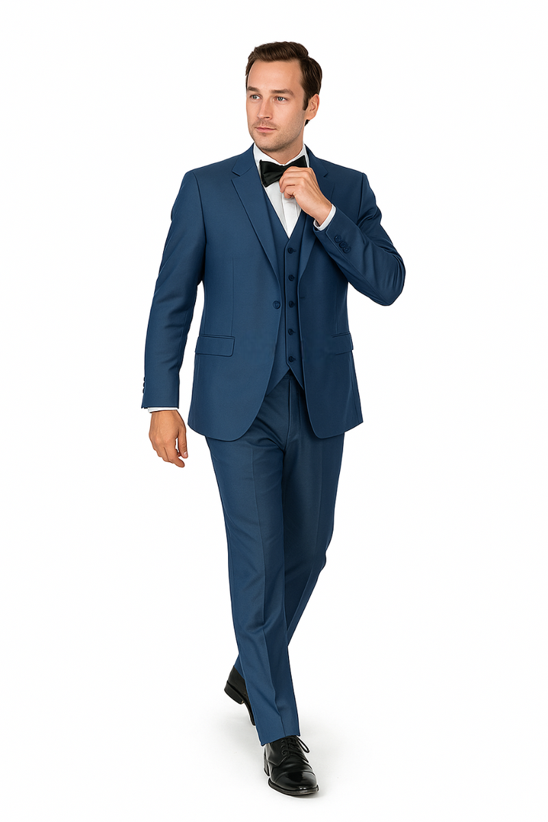 Medium blue tuxedo with tailored fit, peak lapel, and straight-cut pants. Features a three-button front, matching vest, and a lightweight, subtly shiny fabric (possibly synthetic).