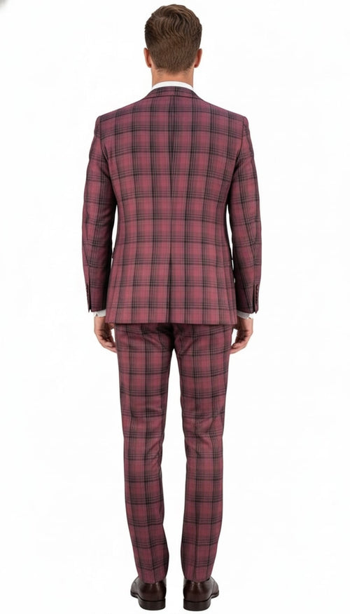 Men's burgundy plaid 3-piece suit. Fitted design with checkered pattern. Tailored jacket, matching trousers to ankles, and vest. Noticeable fabric texture with burgundy and darker hues. Single back vent.