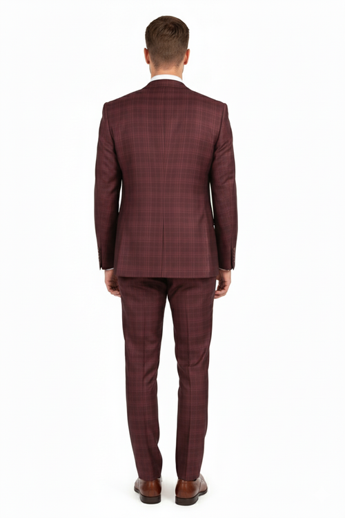 Men's burgundy three-piece suit: fitted blazer, vest, and pants. Windowpane plaid pattern in varying burgundy shades. Classic fit, textured fabric, single-vent blazer. Tailored pants.