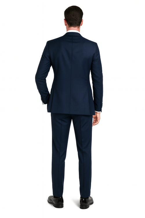 Navy blue men's tuxedo with satin peak lapel. Includes vest, pants & bow tie in navy sateen. A classic three-piece formal suit.