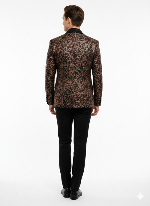 Black designer blazer with red & gold abstract pattern, notched collar & fitted shape. Luxurious sheen enhances intricate details. Paired with black trousers for a formal look.
