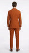 This product is a burnt orange double-breasted suit made of a textured material. The jacket features a straight back with defined shoulder seams. The trousers have a tailored fit, tapering at the ankles.