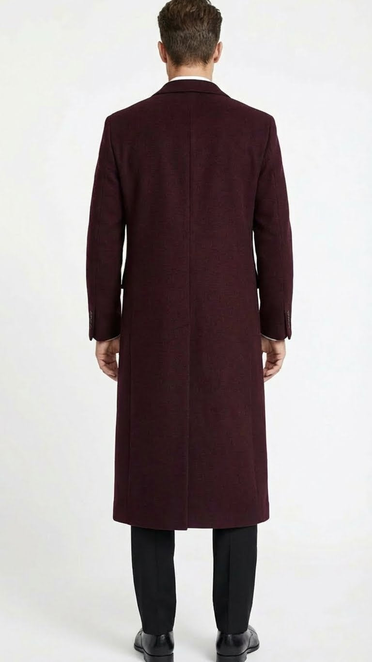 Men's burgundy long coat. Classic fit, wool blend. Straight back, mid-calf length, tailored appearance. Long sleeves, single back vent. Solid burgundy color.