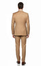Men's camel bronze khaki double-breasted suit. Tailored fit, structured silhouette, smooth fabric. Six-button design, straight-leg trousers. Warm khaki color, clean back. Paired with brown shoes.
