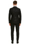 Black sequin tuxedo suit with satin shawl lapel. Tailored fit, quilted back, slim pants. Sparkling fabric and cohesive design.