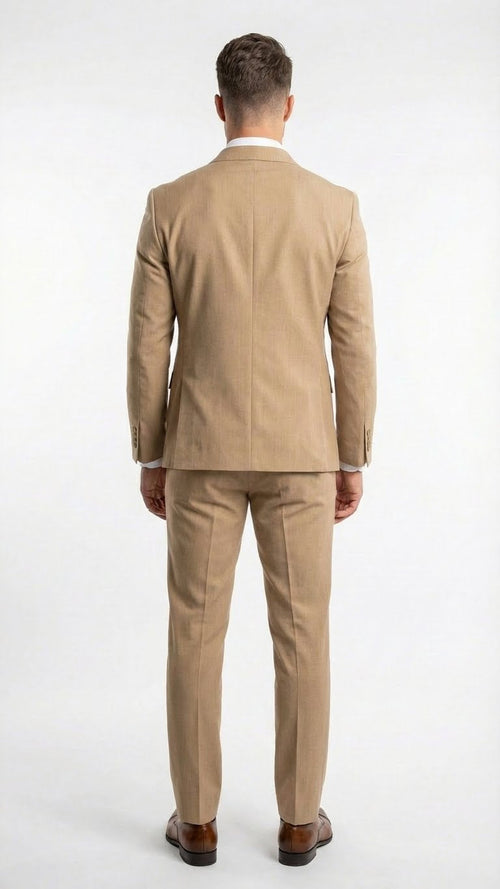 The vitali brand men's beige double-breasted suit features a tailored silhouette with two rows of buttons on the front and a structured back. The suit is made from a light beige fabric with a subtle texture.