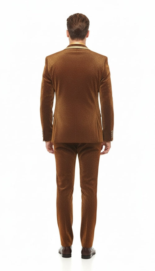 Men's bronze velvet suit with textured pattern. Includes blazer & pants. Gold lapel accents enhance the shiny finish. Stylish and eye-catching.