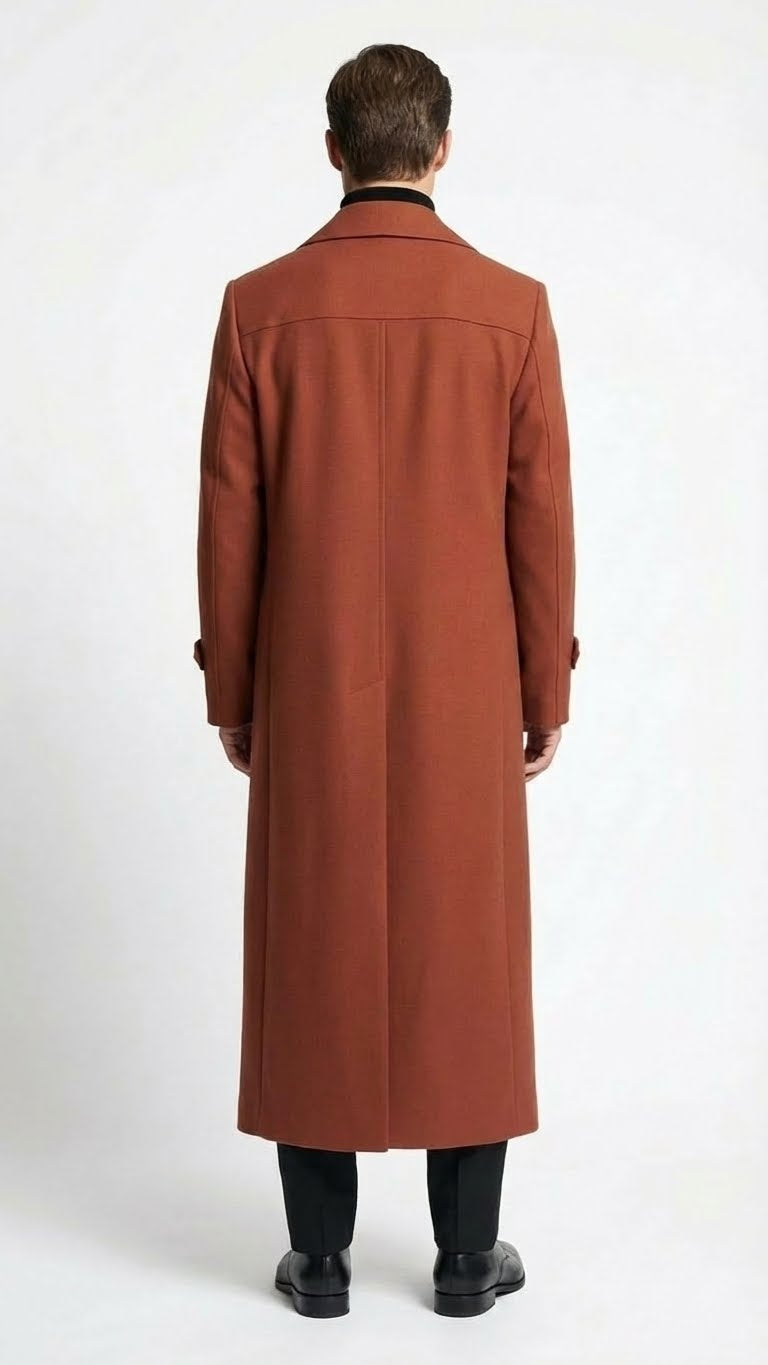 Alberto Nardoni men's cognac overcoat. Full length, streamlined silhouette with mid-calf length. Smooth, textured fabric. Classic collar, tailored sleeves, button closure. Detailed stitching, no patterns.