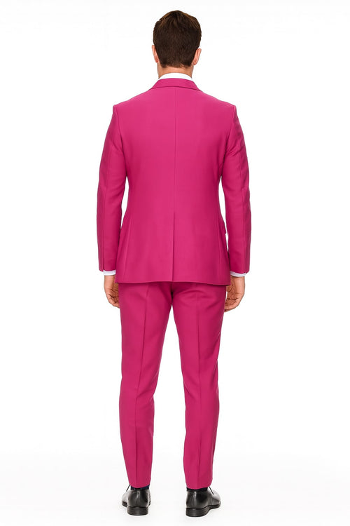 Men's hot pink tuxedo. Smooth, solid fabric. Shawl lapel jacket with tailored fit, center vent. Slim-fit pants. Uniform hot pink color. Perfect for a bold statement.