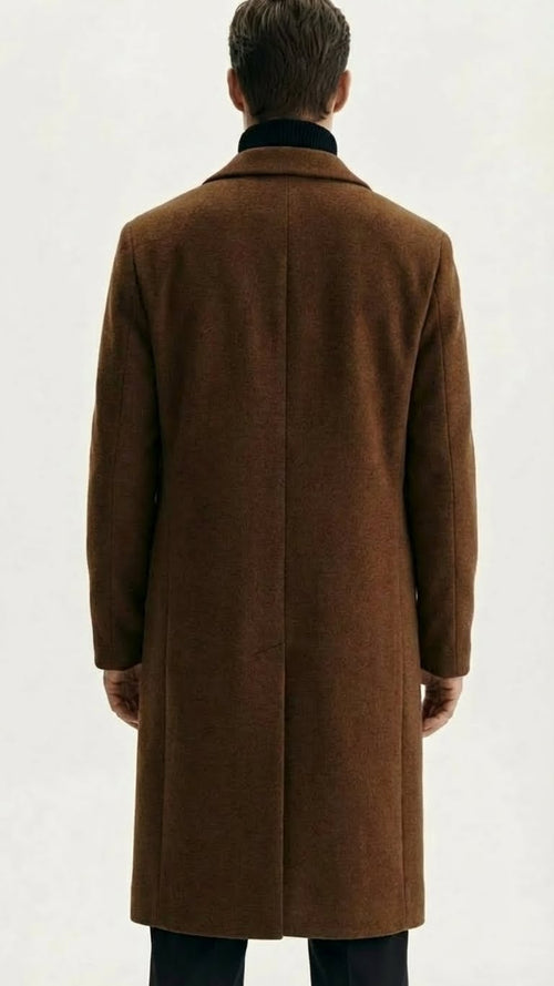 Alberto Nardoni men's brown wool overcoat. Straight silhouette, tailored collar, single back vent. Textured wool in rich brown. Long, fitted sleeves and lined interior for warmth.
