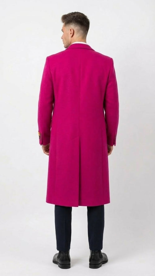Hot pink men's overcoat. Wool blend, long with straight silhouette. Notch collar, tailored fit. Single rear vent.
