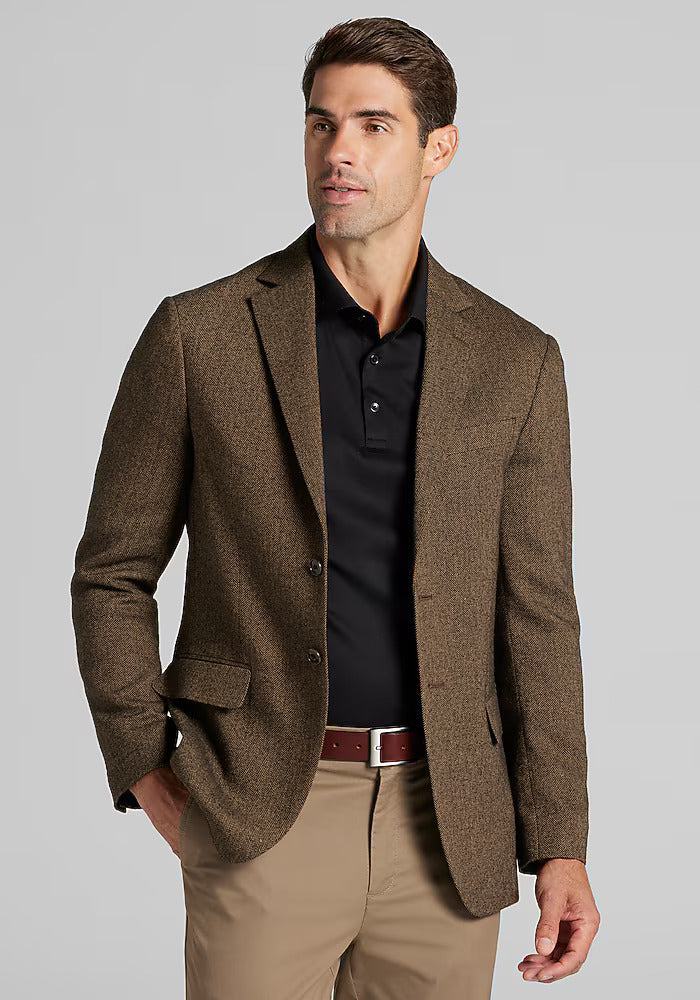 Alberto Nardoni's 1905 sportcoat: tailored fit, herringbone pattern, single-breasted. Features textured brown fabric, notched lapel, flap pockets, button closure & cuffs for a streamlined silhouette.