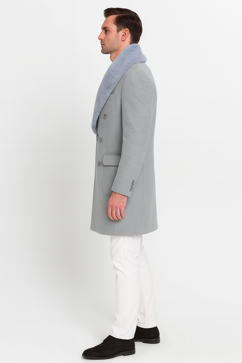Men's light grey wool double-breasted overcoat with faux fur shawl collar, structured fit, and side flap pockets.