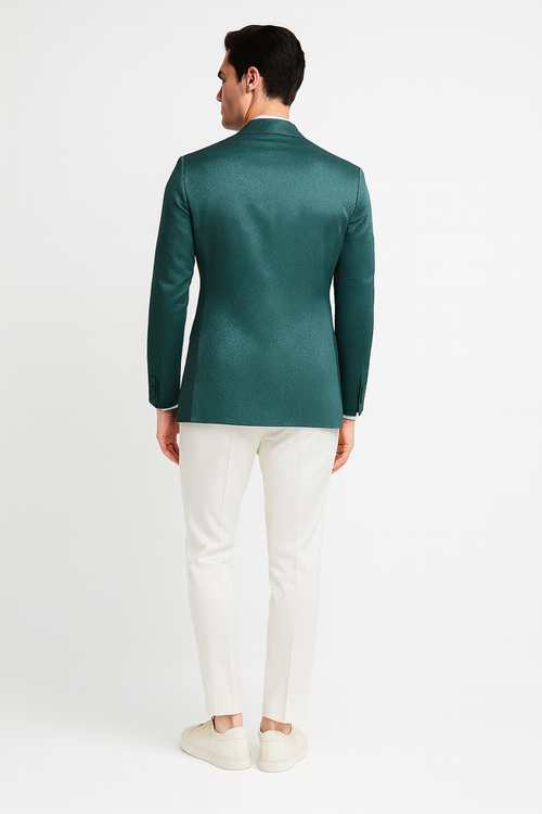 Men's teal green floral jacquard blazer. Slim fit, structured shape with tonal floral pattern. Notched lapels, long sleeves, waist length. Smooth fabric with slight sheen.
