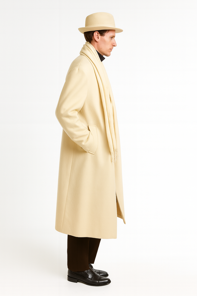 Men's cream wool long overcoat. Straight silhouette, full length, reaching lower legs. Front opening.