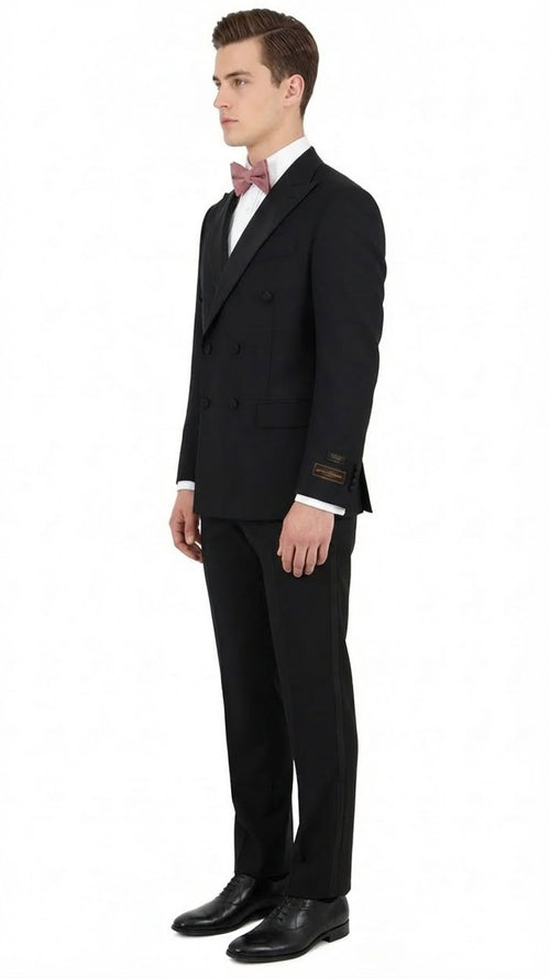 Men's classic black double-breasted tuxedo. 100% Italian wool, super 150s. Tailored fit, structured design, black with white cuffs and buttons. Includes pink bow tie & black dress shoes.