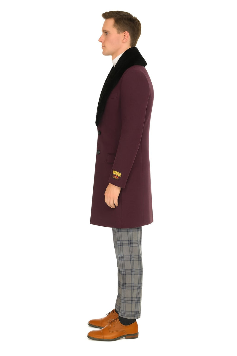 Deep purple wool men's overcoat with black faux fur collar. Fitted silhouette, two front buttons, side pockets, and tailored sleeve ends.