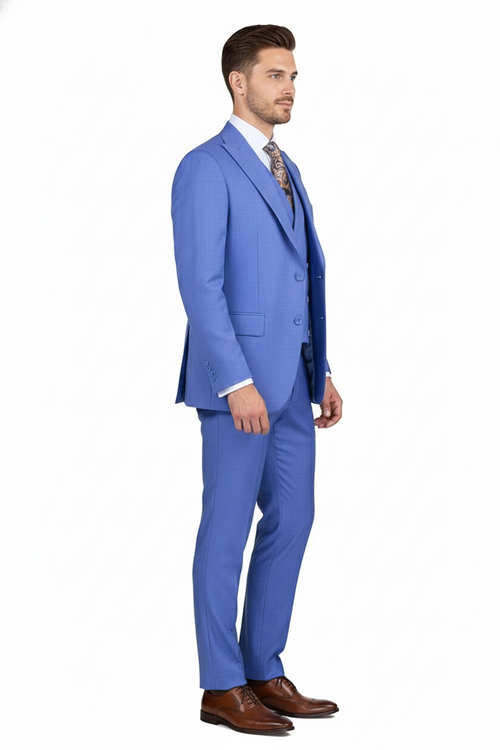 Light blue men's 3-piece double-breasted suit. Features a fitted jacket with peaked lapels, matching vest, and tailored trousers. Smooth, textured fabric. Completed with brown dress shoes.