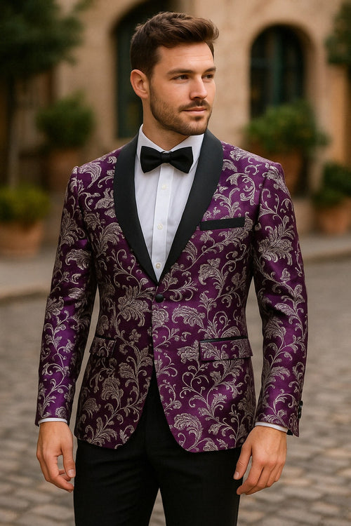 Purple & white paisley floral brocade tuxedo jacket with satin lapel. Paired with black pants. Structured fit & intricate pattern. Stylish men's formal wear.