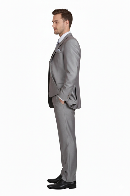 Men's light gray 3-piece modern fit suit. Tailored blazer, trousers, and vest. Textured fabric, sleek silhouette, structured shoulders, notched lapel. Streamlined vest design.