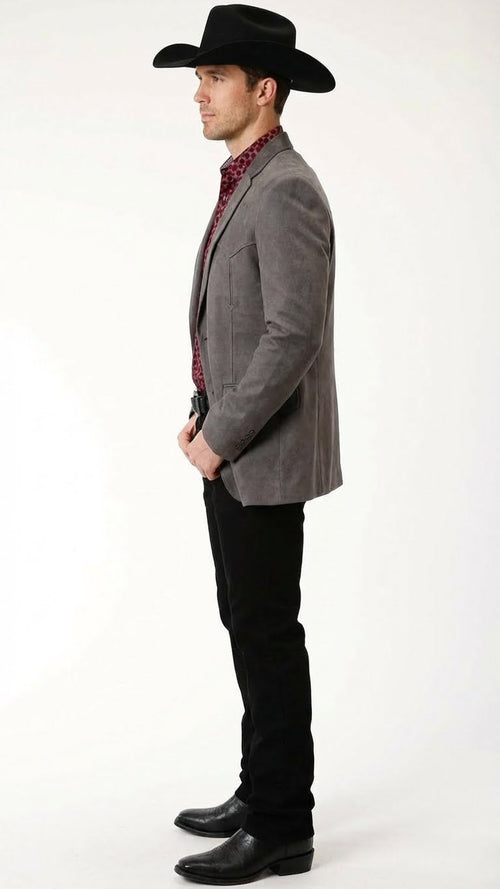 Men’s brown western faux suede blazer by Alberto Nardoni features a fitted silhouette with a notched lapel, two front pockets, and a soft texture. The color appears even and rich throughout the surface.