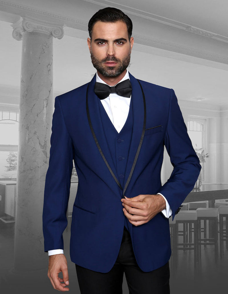 Sapphire blue men's wool tuxedo with shawl lapel and satin trim, black detailing. Includes vest, button-up front, and side pockets. Classic style.