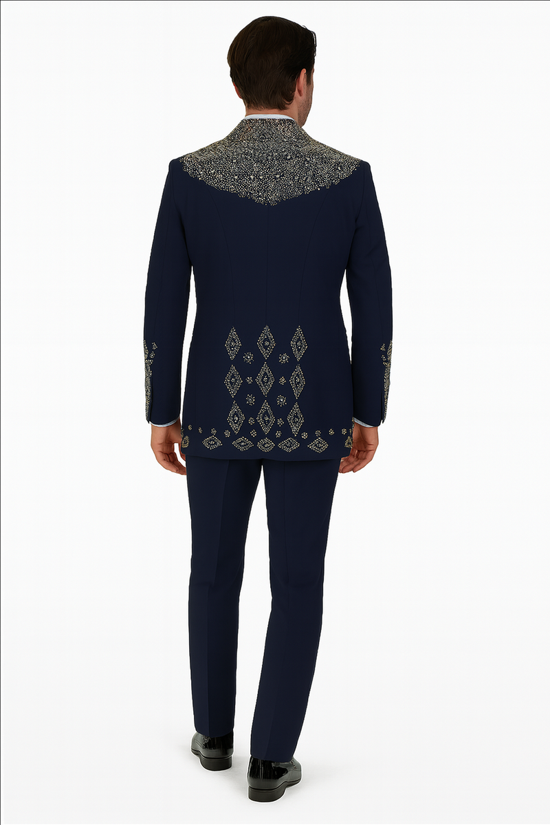Navy tuxedo with gold embroidery. Structured, tailored fit. Gold details on collar, shoulders, and lower back. Classic elegance.