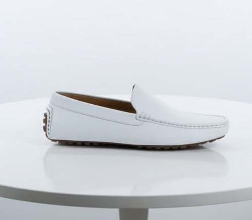 Men's white leather loafers: classic slip-on design, rounded toe, minimal stitching. Textured sole for grip. Simple and stylish.