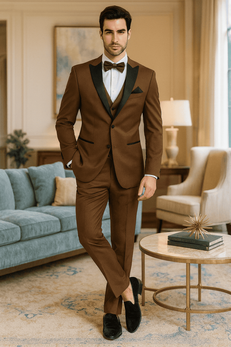 Light brown men's tuxedo suit with black satin lapel. Three-piece design: jacket, trousers, waistcoat. Includes white shirt, pocket square & bow tie. Tailored fit, smooth fabric, formal look.