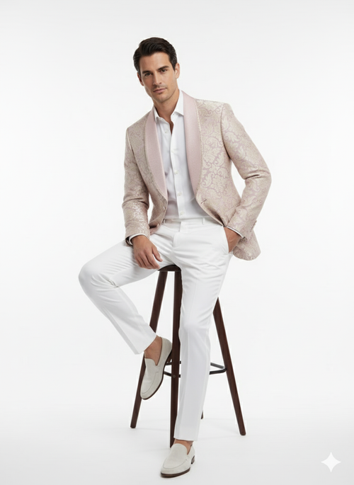 Lavender and gold men's tuxedo with embroidered lilac mauve floral blazer, single-button closure, and peaked lapels. Paired with white trousers and light slip-on shoes. Shiny, smooth texture.