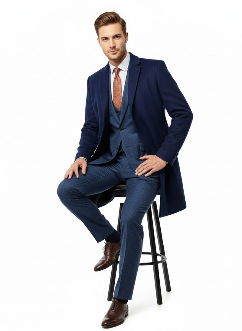 Cobalt blue wool & cashmere car coat. Long, straight cut with tailored fit. Single-breasted front, notch lapels.
