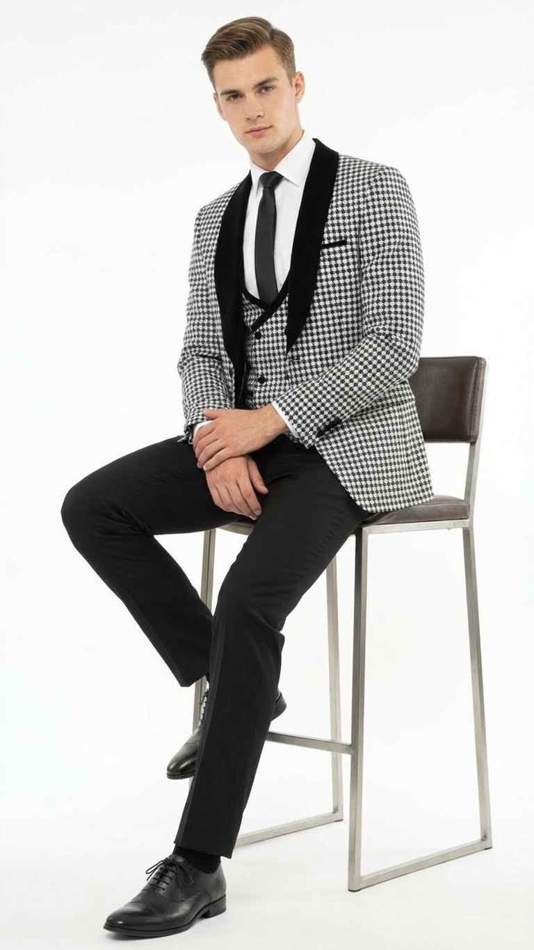 Men's black & white houndstooth tuxedo set: blazer w/ velvet shawl lapel, paired w/ slim black pants. Classic houndstooth pattern on the blazer.