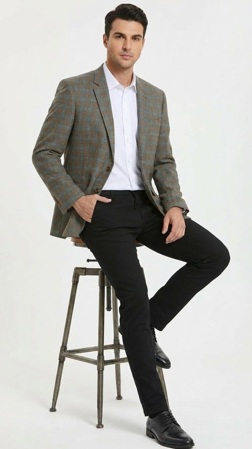 Men's plaid sport coat in green, brown, and teal. Textured fabric, notched lapels, tailored fit. Single-breasted, two buttons. Worn with white shirt, black trousers. Earthy & cool tones contrast.