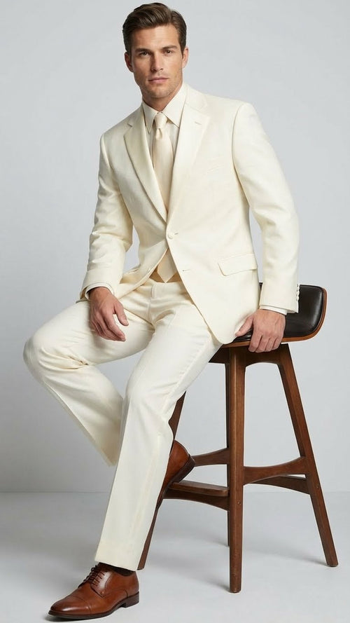Men's ivory tuxedo suit with satin notch lapel. Tailored fit, single-breasted jacket, and matching trousers. Solid ivory color.