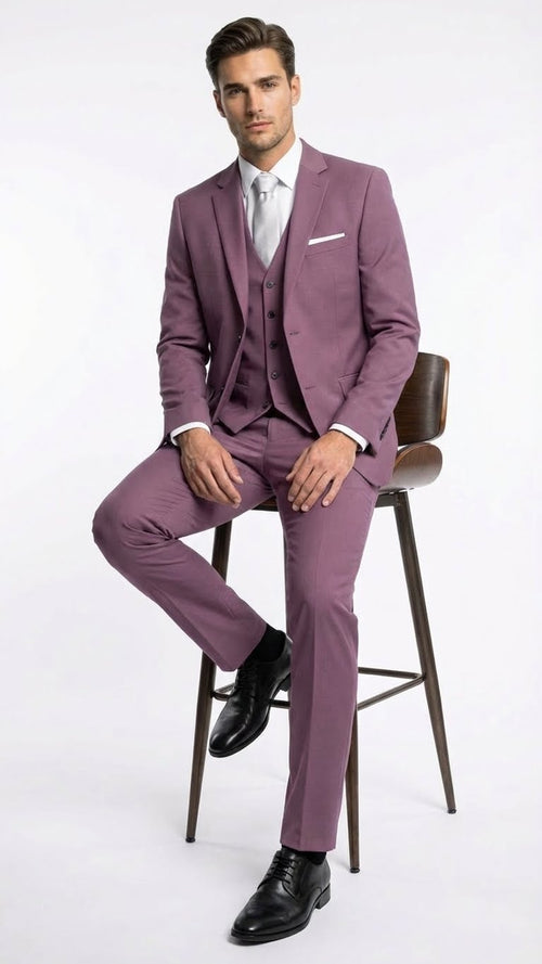 Men's slim-fit mauve three-piece suit: blazer (notch lapel), vest (3 buttons), and tailored trousers. Subtle patterned fabric creates a polished, formal look.