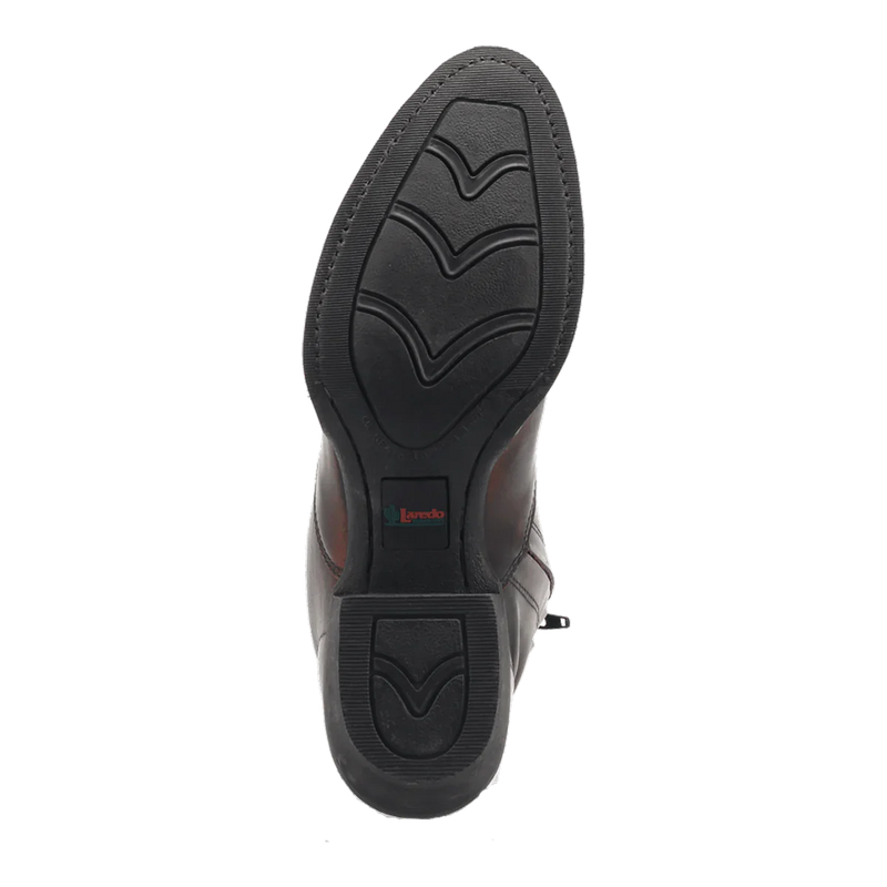 Laredo Men's Fletcher boots: black leather, round toe. Durable black rubber outsole with textured surface and a flat, rounded shape, featuring a distinct tread pattern.