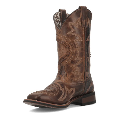 Laredo Charli women's boot: tall brown leather shaft, pointed toe, stacked heel. Intricate side stitching, curved top, and pull tabs for easy wear.